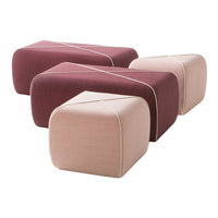 Set of three modern poufs in soft pink and deep burgundy with clean lines and subtle geometric patterns.