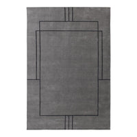 Gray area rug with geometric black line patterns and a modern design. Perfect for contemporary home décor.