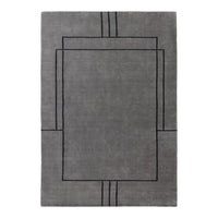 Gray area rug featuring geometric black line patterns, adding modern elegance to any space.