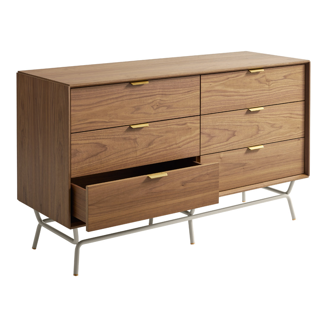 Wooden dresser with a rich walnut finish, featuring six smooth drawers and gold-tone hardware, set on minimalist metal legs.