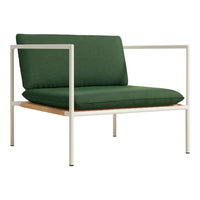 Green cushion armchair with a modern white metal frame and wooden base, perfect for contemporary decor.