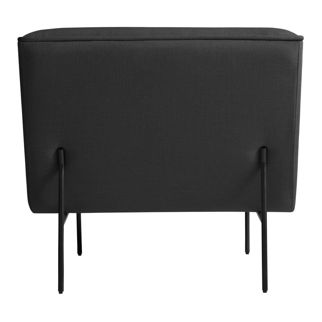 Black fabric storage box with sleek black metal legs, featuring a minimalist design and solid surface.