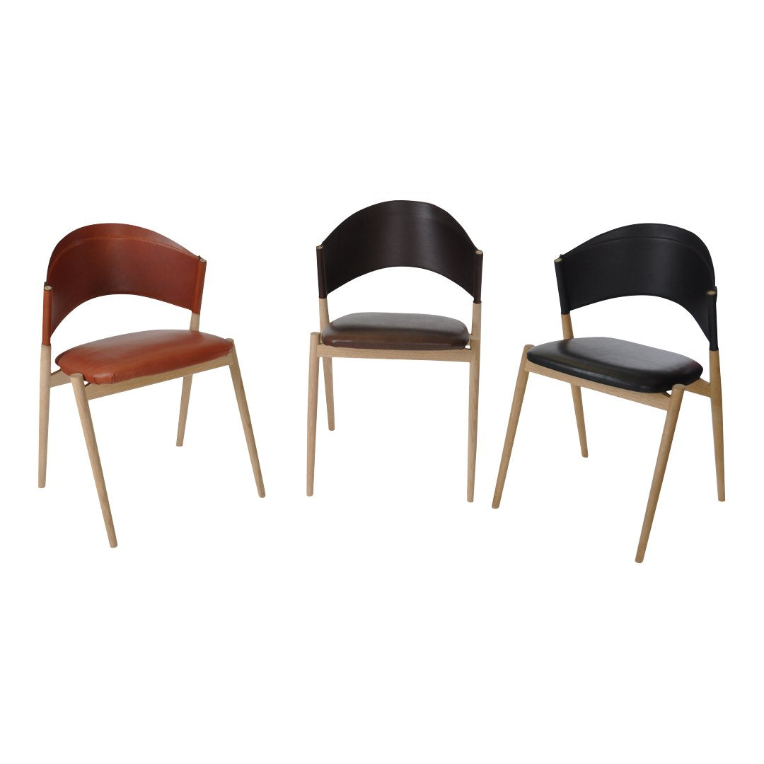 Set of three modern chairs featuring brown, black, and gray colors with sleek, minimalist designs and curved backs.