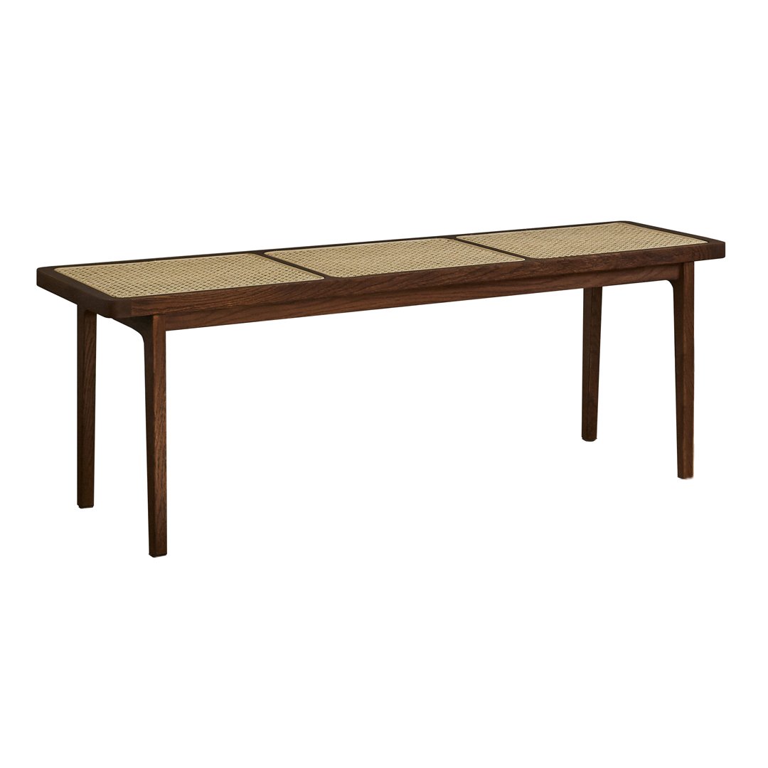 Long rectangular brown wooden table with woven cane patterns on top, perfect for rustic or modern decor.