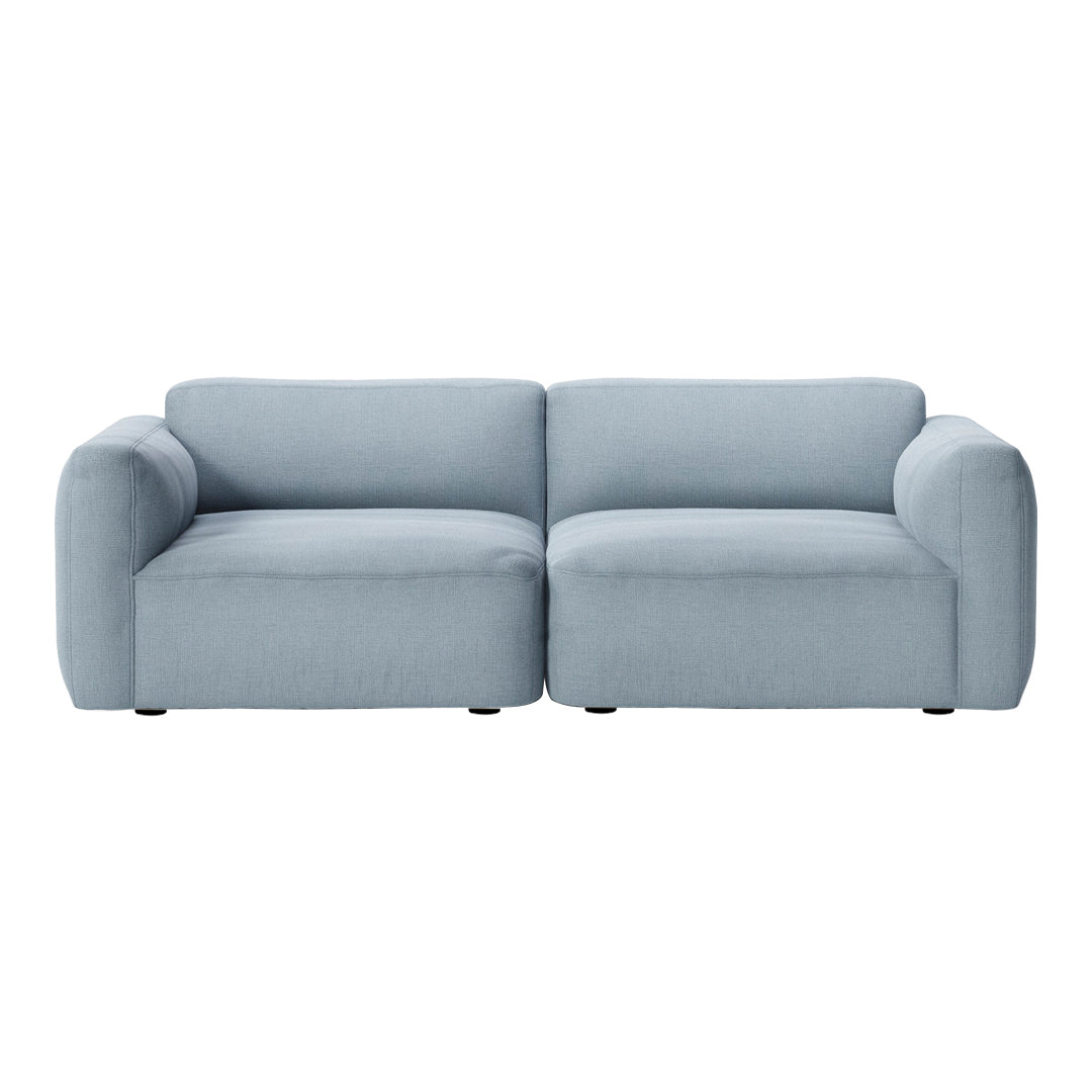 Light blue upholstered sofa with a smooth, modern design and minimalistic style. Perfect for contemporary interiors.