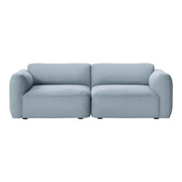 Light blue upholstered sofa with a smooth, modern design and minimalistic style. Perfect for contemporary interiors.
