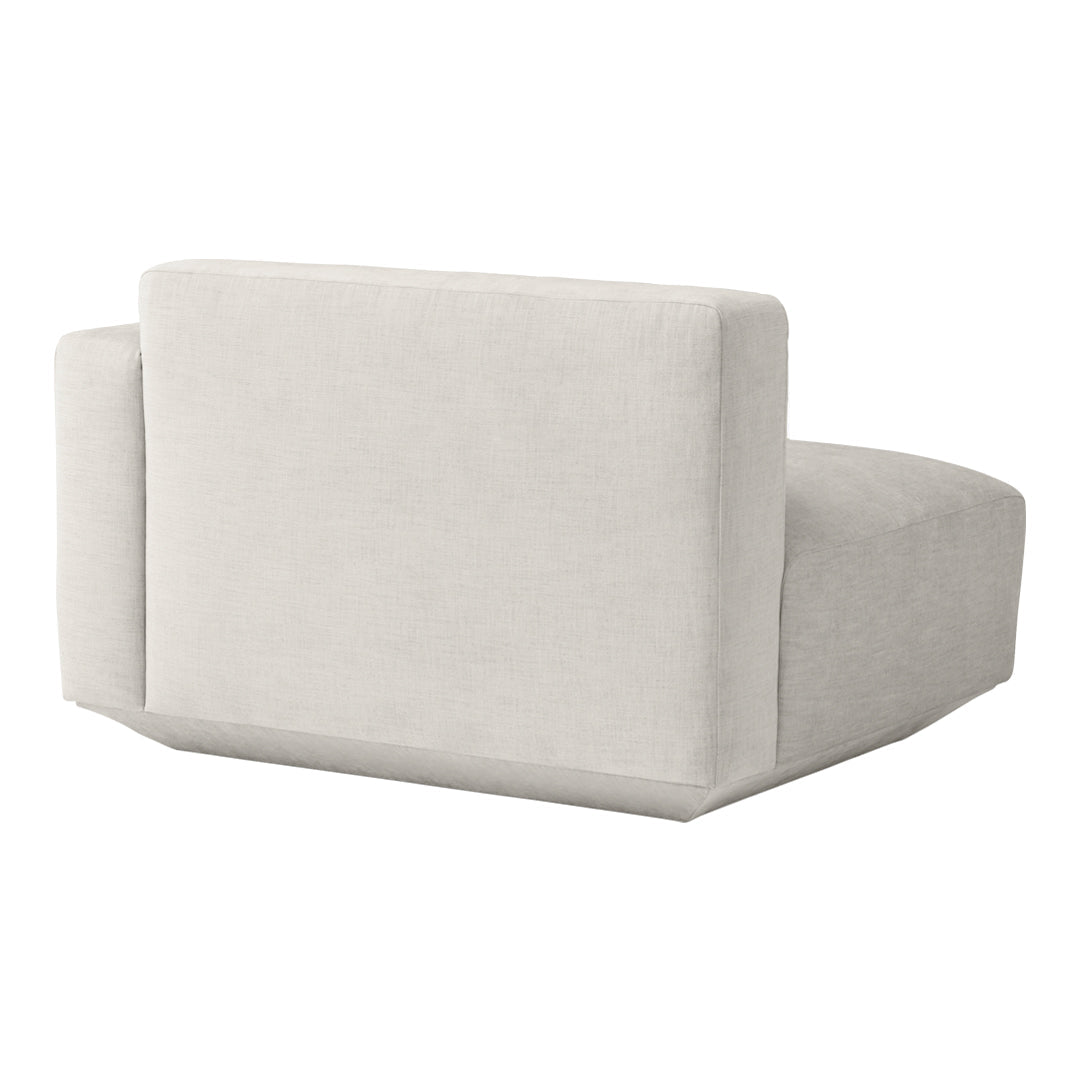 Neutral beige upholstered chair with a modern, minimalist design and a soft, textured finish.