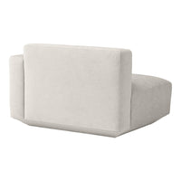 Neutral beige upholstered chair with a modern, minimalist design and a soft, textured finish.