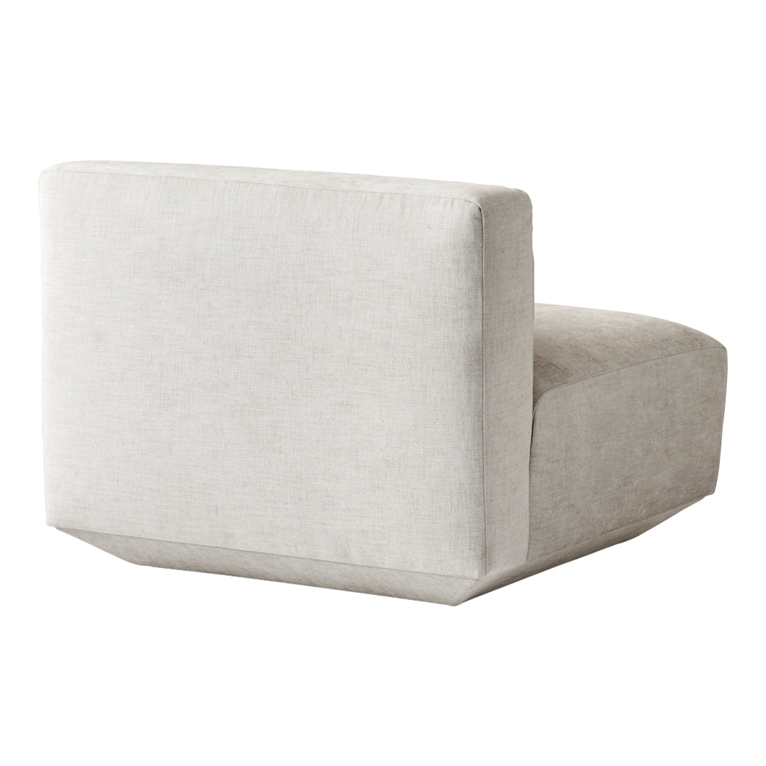 Light gray modular chair with a smooth, minimalist design and subtle texture, perfect for contemporary spaces.