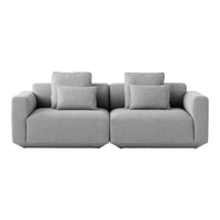 Gray modern sofa with a sleek design and plush cushions, featuring a solid color for a contemporary look.