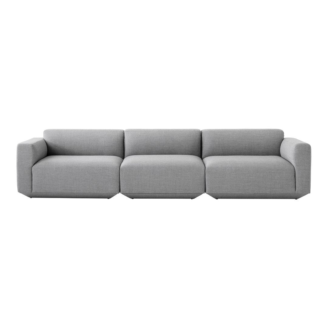 Modern gray sectional sofa with a sleek, minimalist design and clean lines, perfect for contemporary interiors.