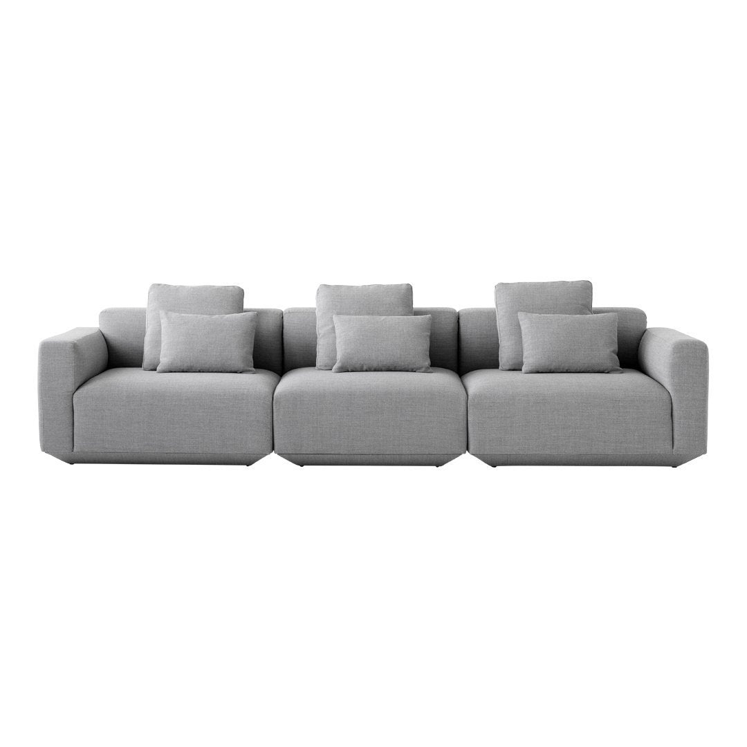 Modern gray sofa with clean lines and textured cushions, perfect for contemporary living spaces.