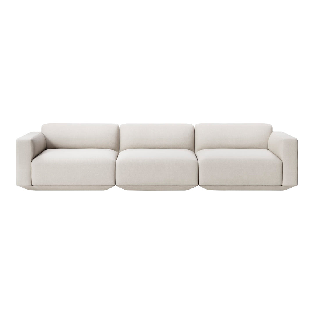 Light beige sofa with a sleek, modern design and smooth, textured fabric. Ideal for minimalist decor.