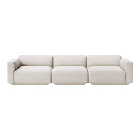 Light beige sofa with a sleek, modern design and smooth, textured fabric. Ideal for minimalist decor.