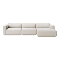 Beige modular sectional sofa with a clean, minimalist design and soft, textured fabric. Perfect for modern interiors.