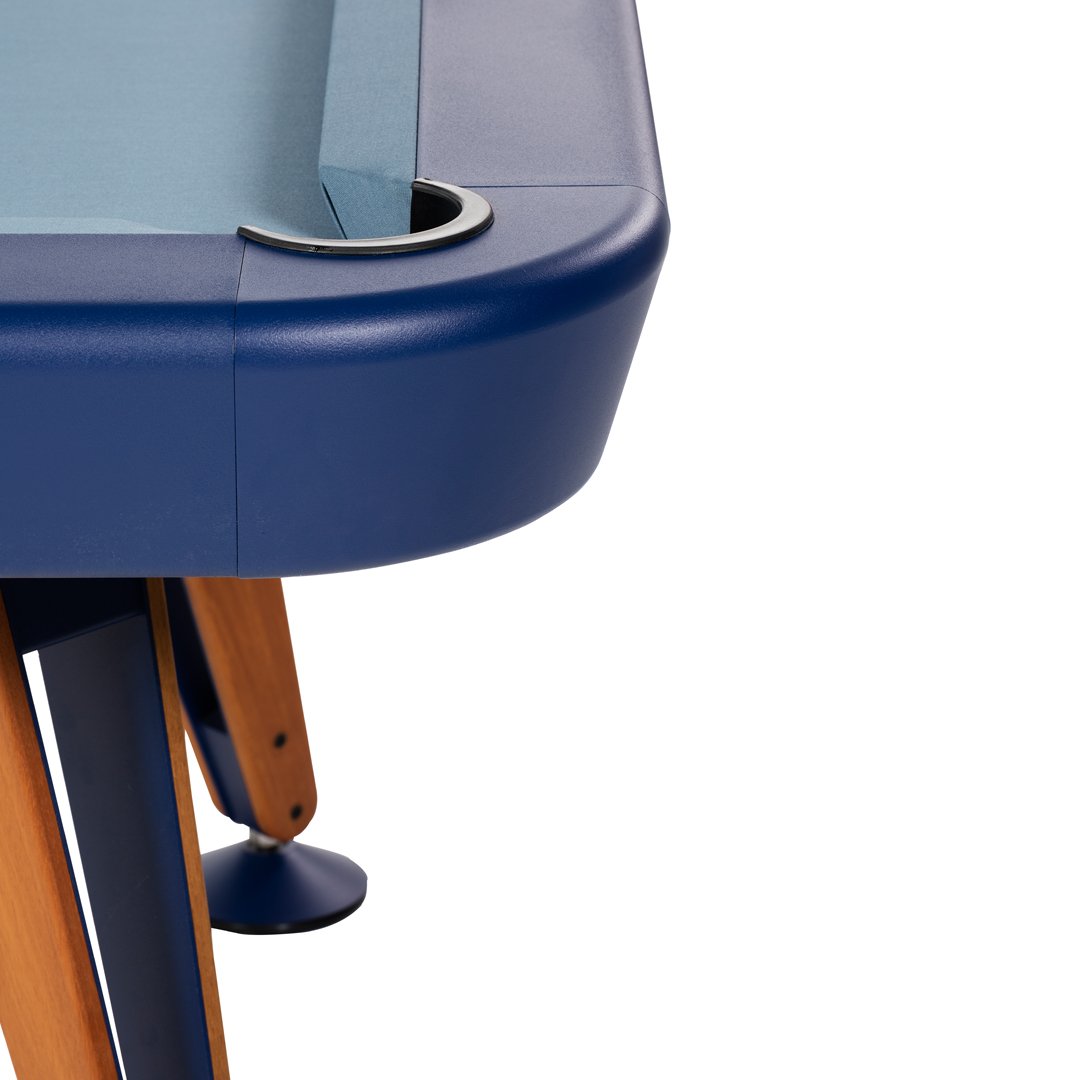 Navy blue table edge with light blue felt and wooden legs, featuring smooth curves and a sleek design.