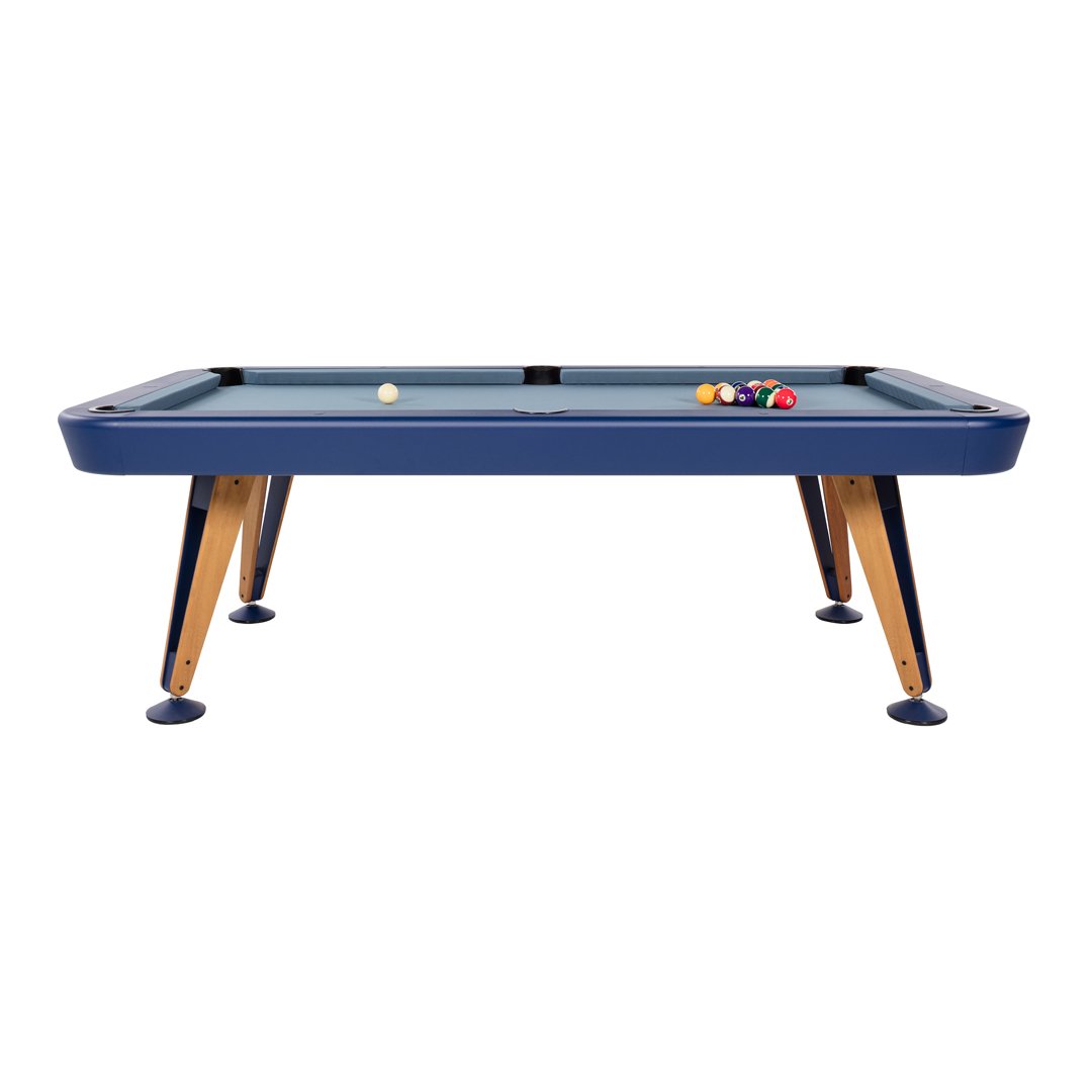 Navy blue pool table with light blue felt and natural wood legs, featuring colorful billiard balls.