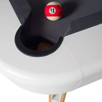 Red and cream billiard ball on gray felt and white table, featuring black pocket edge and natural wood legs.