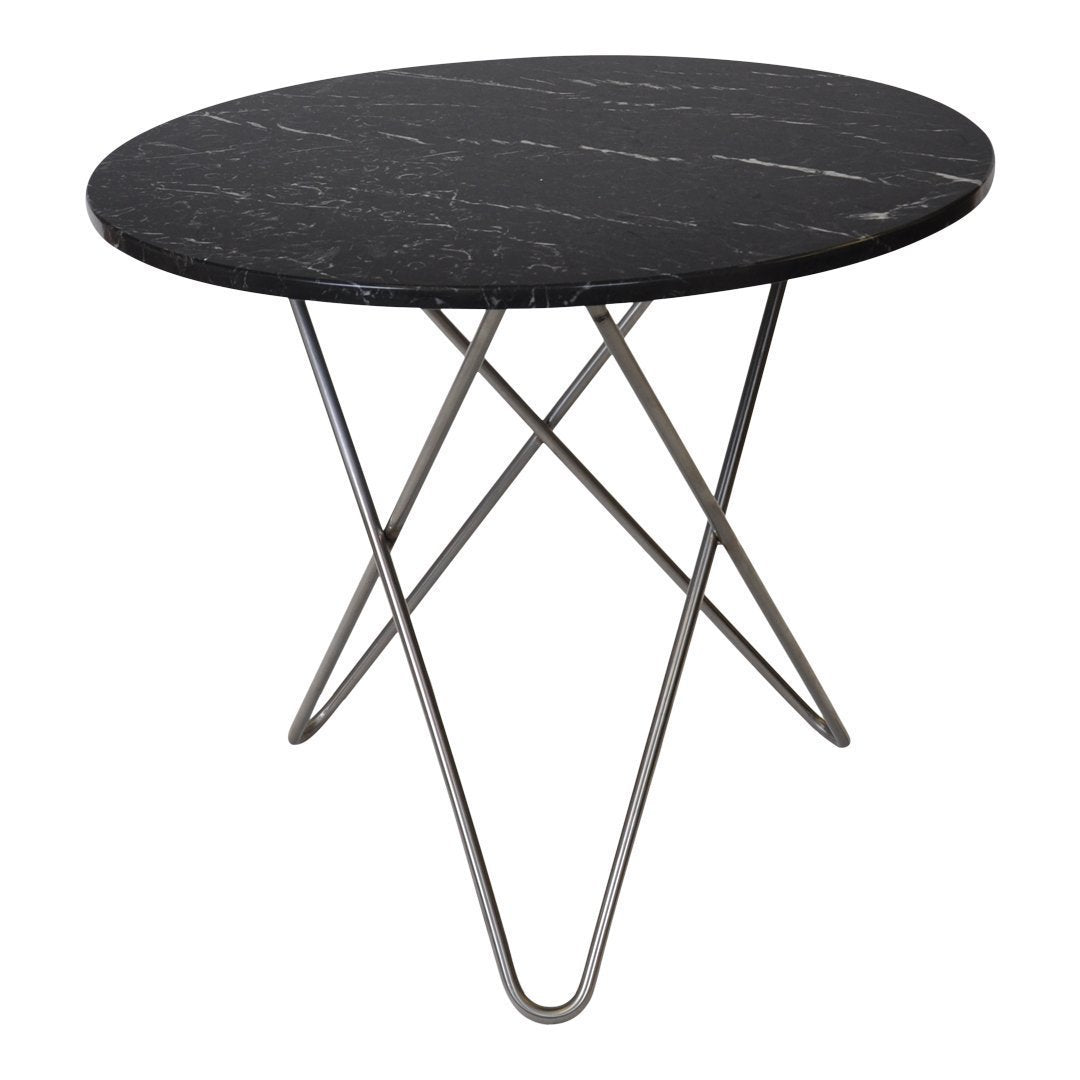 Round black marble table with subtle white veining and sleek silver metal tripod base. Modern design for any decor.
