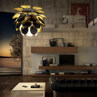 Modern pendant lamp with a sleek gold and black design, featuring a unique petal-inspired pattern for contemporary decor.