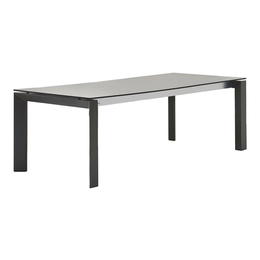 Rectangular dining table with a sleek gray top and black metal legs, featuring a modern minimalist design.