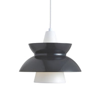 Modern pendant lamp featuring a sleek black and white design with smooth, overlapping curves. Perfect for contemporary decor.