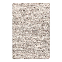 Neutral-toned textured rug with soft cream and brown speckled pattern, ideal for versatile home decor.