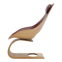 "Modern curved chair in natural wood finish with deep burgundy accent and sleek, minimalist design."
