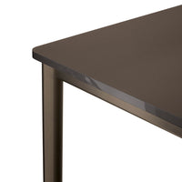 Dark brown surface with a sleek finish and subtle textured pattern, complemented by golden-toned metal legs.