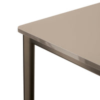 Neutral taupe tabletop with a sleek metallic edge, perfect for modern decor.