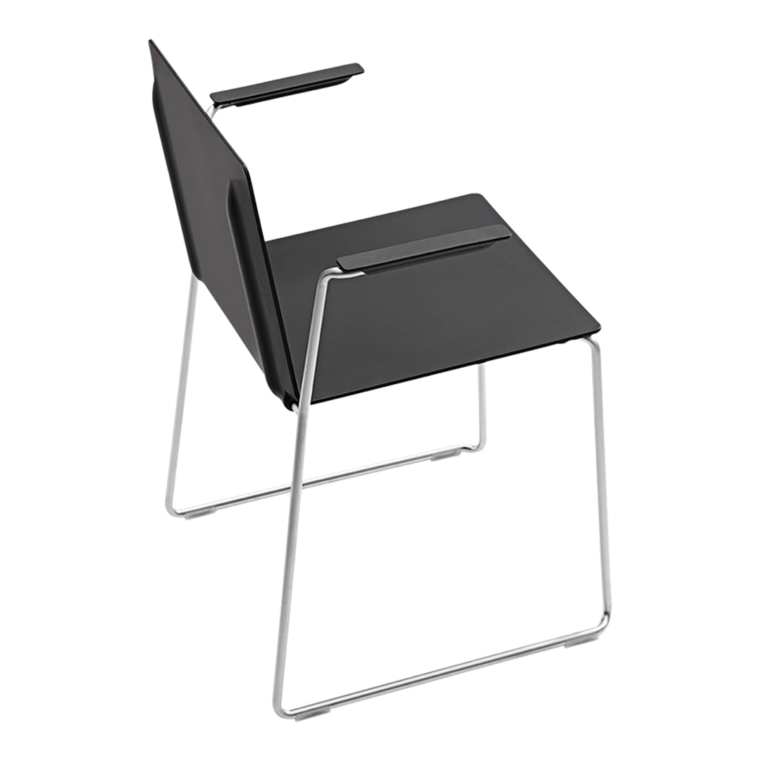 Modern black chair with minimalist design, featuring a sleek chrome frame and smooth, solid seat.