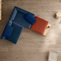 "Modern sectional sofa featuring a deep blue and vibrant orange color scheme with sleek, minimalist design."
