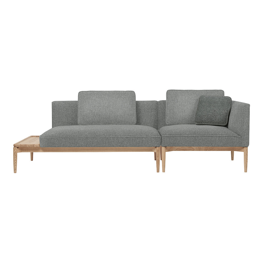 Gray sectional sofa with textured upholstery and a light wooden frame, featuring clean lines and minimalistic design.