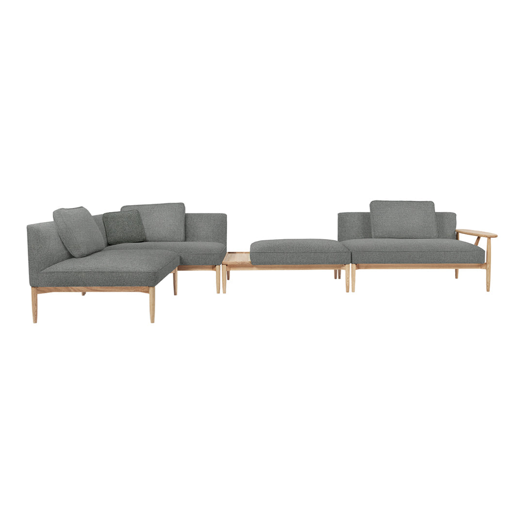 Gray upholstered sectional sofa with light wood legs and clean lines, perfect for modern living spaces.