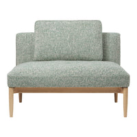 Light green textured fabric loveseat with minimalist design and natural wood legs. Perfect for modern decor.