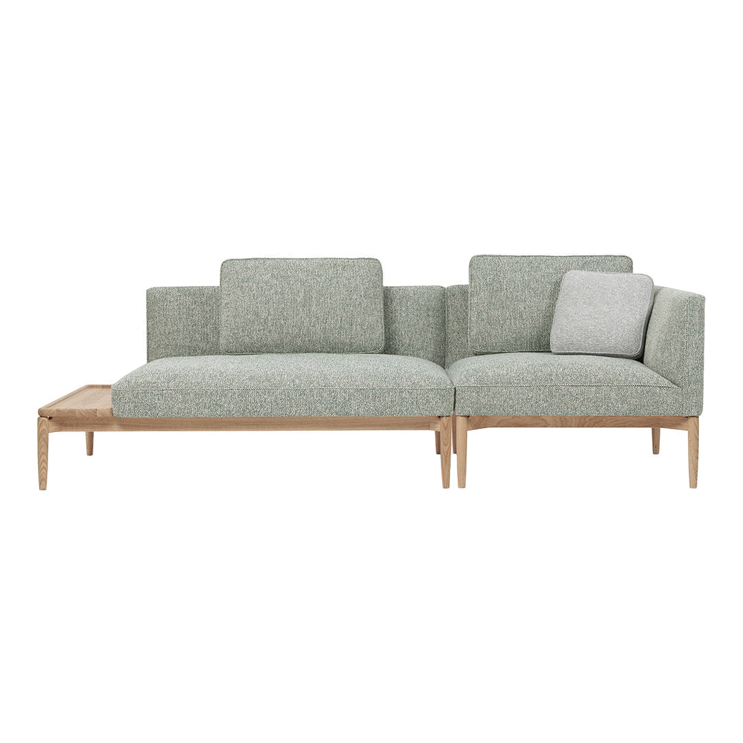 Light gray textured fabric sofa with natural wood legs, featuring a simple modern design and a single accent cushion.