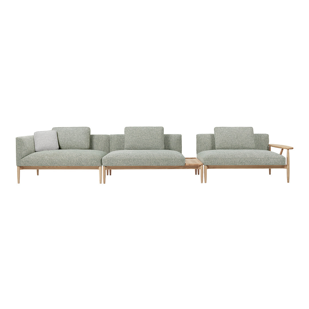 Light gray three-piece sofa set with modern lines and a subtle texture for a contemporary living space.