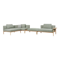 Light green fabric sectional sofa with a simple, modern design and wooden legs, featuring a solid color pattern.