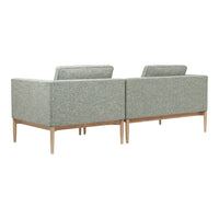 Light green modern sofa with subtle textured pattern and natural wood legs, perfect for contemporary living spaces.