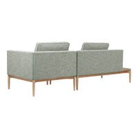 Two-tone light green and beige patterned fabric sofa with wooden legs, modern design, stylish and contemporary.
