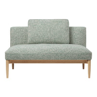 Light green textured upholstery with a subtle pattern, complemented by natural wood legs. Stylish and modern design.