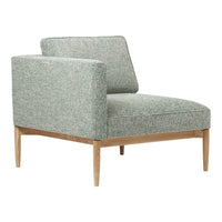Light green upholstered chair with a textured pattern and natural wood legs. Ideal for modern decor enhancement.