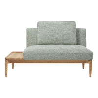 Light green textured fabric sofa with a wooden base, featuring a modern, minimalist design. Perfect for contemporary decor.