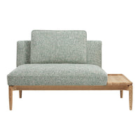 Soft green textured upholstery with a natural wood finish, combining modern design and cozy aesthetics.
