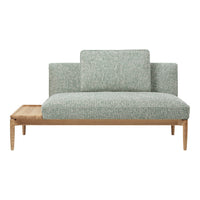 Light teal upholstered sofa with a textured pattern and natural wood base. Modern design with clean lines.