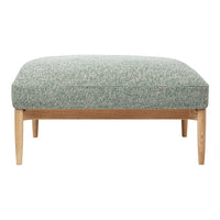 Green textured ottoman with a subtle pattern, featuring light wooden legs for a modern touch.