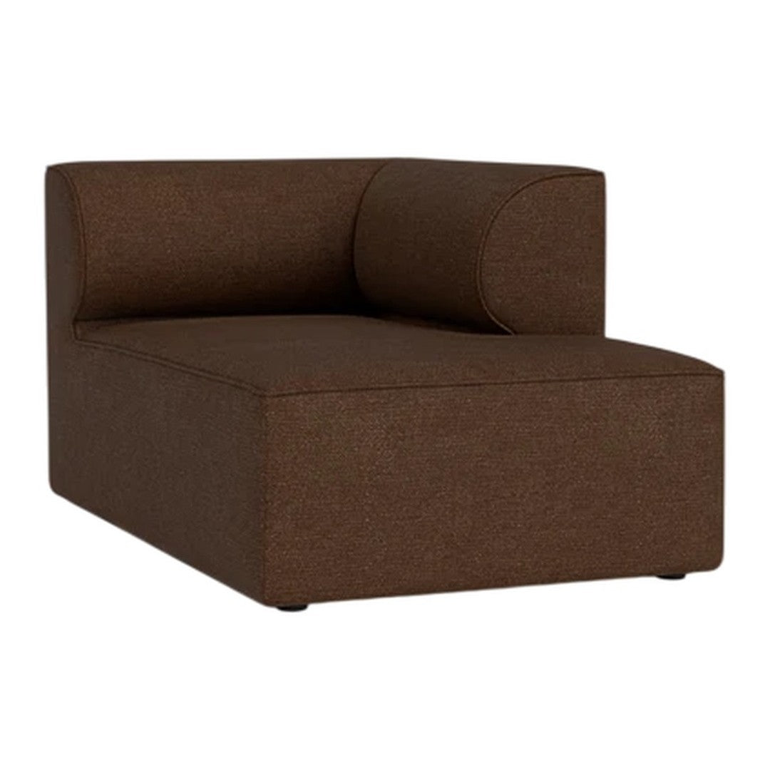 Brown upholstered chaise lounge with a modern, minimalist design and subtle texture. Perfect for contemporary decor.