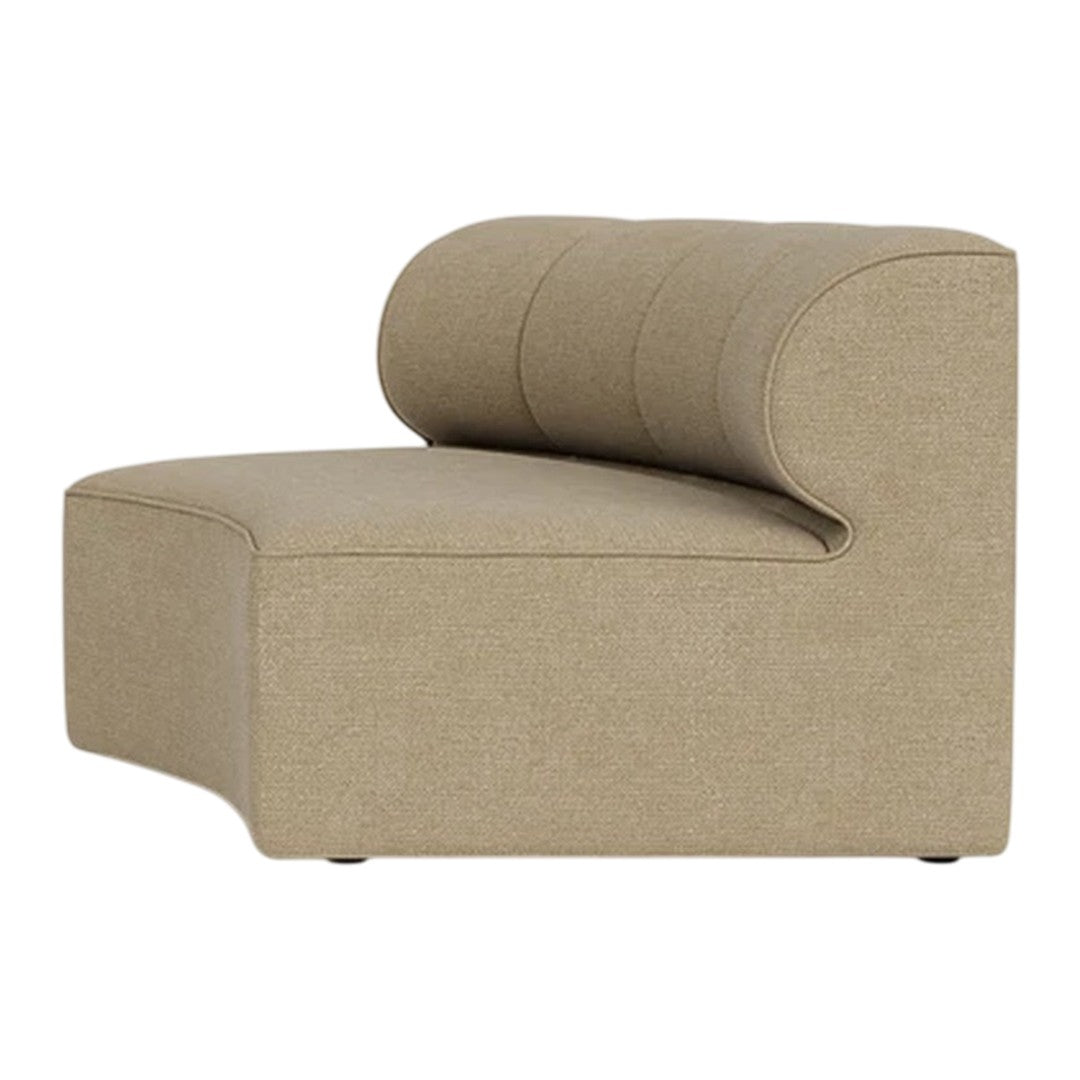 Beige curved upholstered chair with a smooth finish and subtle vertical stitching patterns.