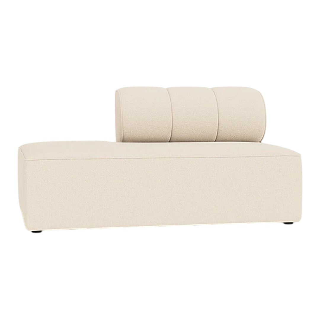 Minimalist beige chaise lounge with smooth texture and subtle curved accents. Perfect for modern decor.