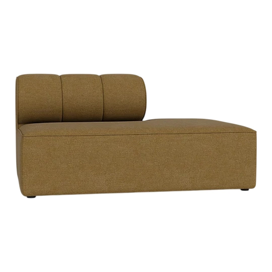 Modern chaise lounge in warm mustard yellow with textured fabric and sleek, minimalist design. Perfect for any living space.